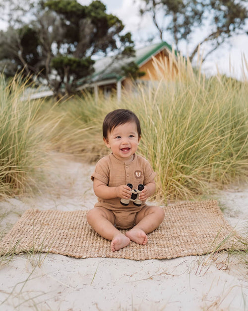 Bebe Sway Textured Embroidered Lion Romper